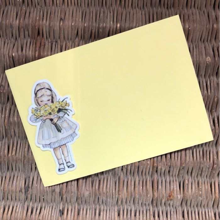 Child with Daffodils Sticker or Magnet