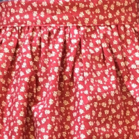 tasha-tudor-apron-red-floral-detail